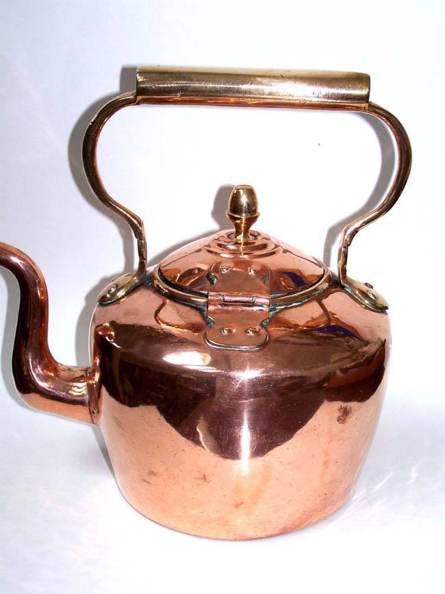 An attractive early Victorian Copper Tea Kettle with decorative hinged lid circa 1840